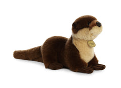 A brown otter plush toy from Miyoni by Aurora with a creamy face and inquisitive eyes.