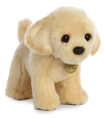 A golden Labrador puppy plush toy from Miyoni Tots by Aurora with soft golden fur and floppy ears.