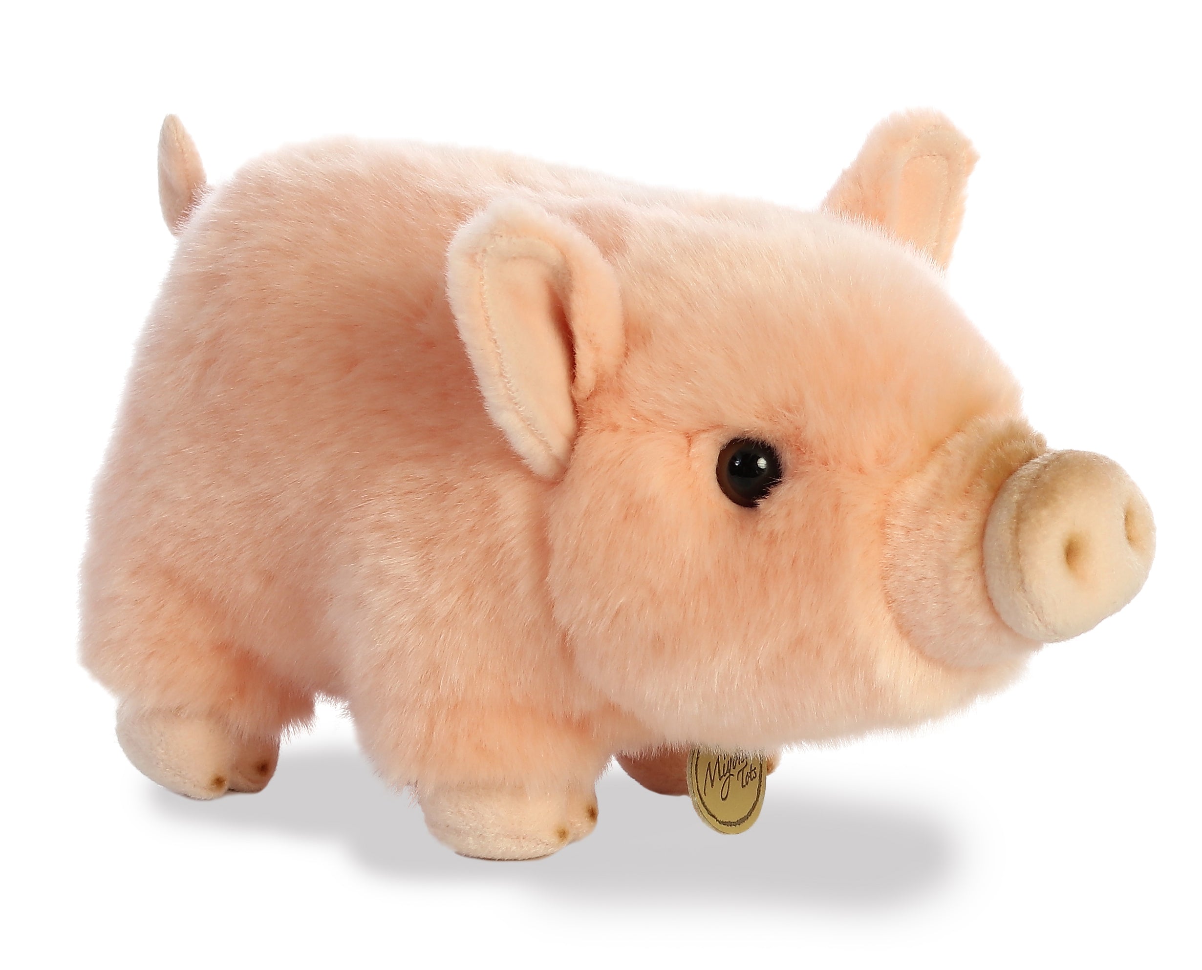 A pink pot-bellied piglet plush toy from Miyoni Tots by Aurora with pink fur and a round snout.