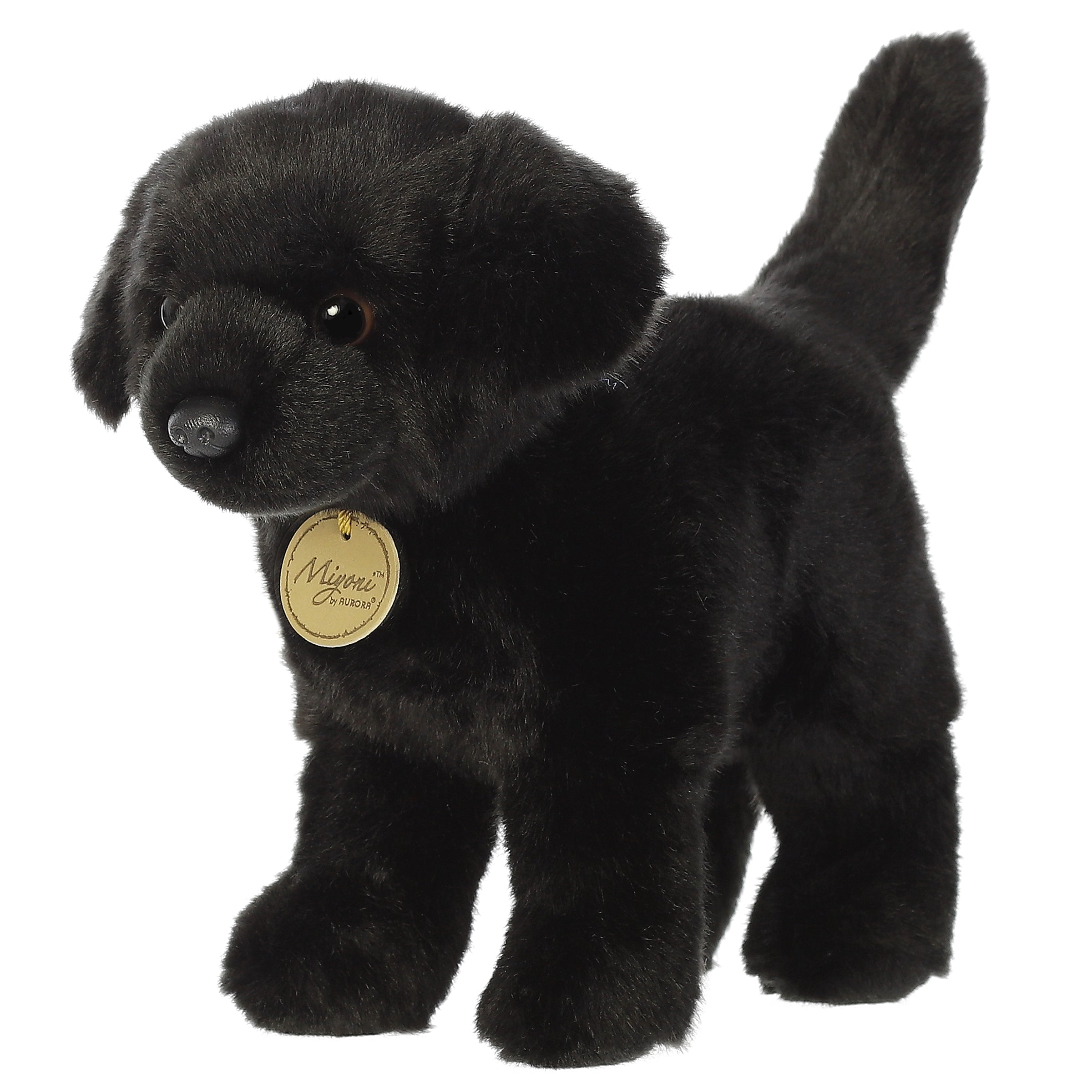 A black Labrador plush toy from Miyoni by Aurora with floppy ears and a glossy black coat.