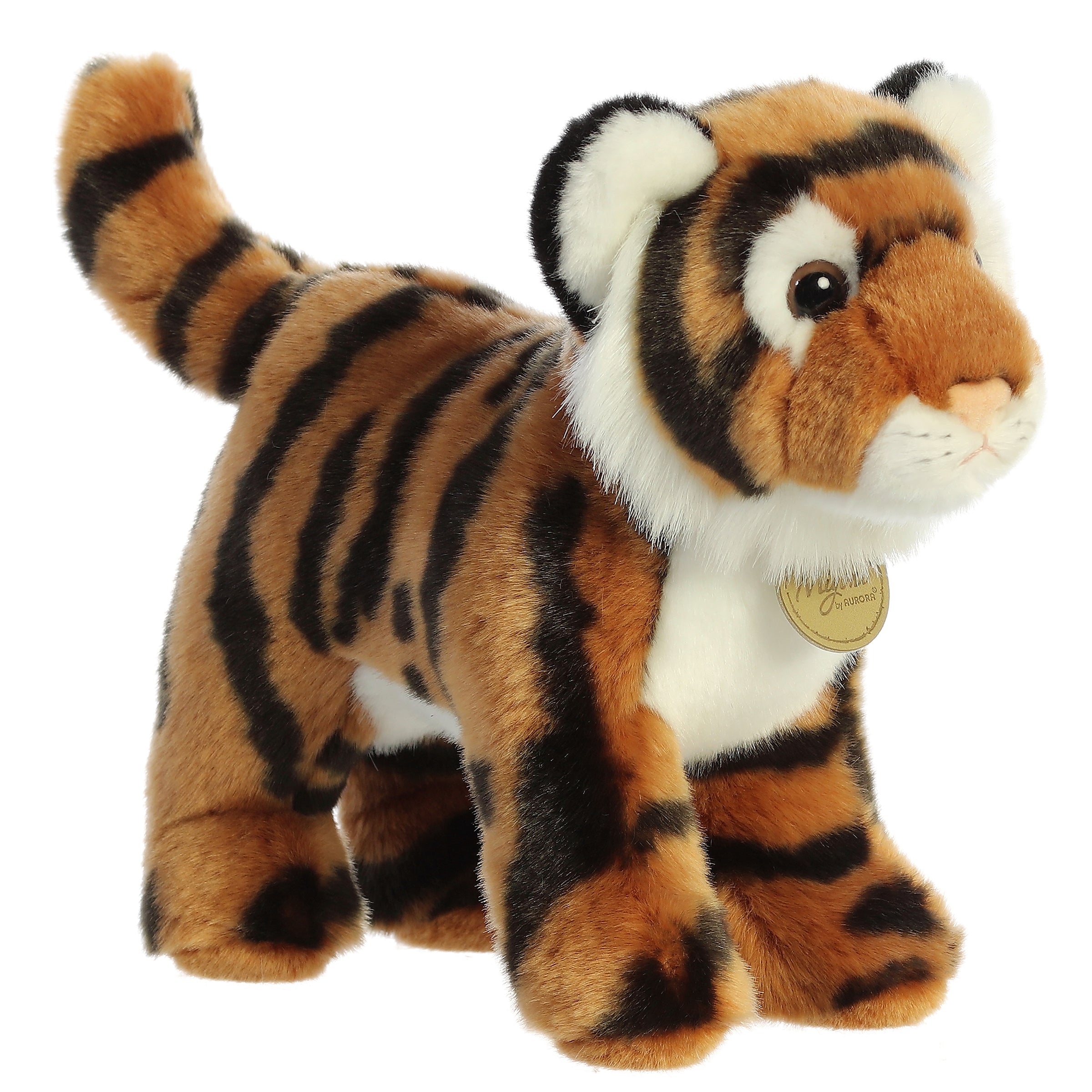 An orange Bengal tiger plush toy from Miyoni by Aurora with black stripes and a white underbelly.