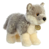 A wolf puppy plush toy from Miyoni Tots by Aurora with grey and cream fur and tall pointed ears.