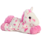A giraffe plush from Mini Flopsie by Aurora with pink spots, a pink mane, and a sweet face.