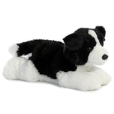 Plush toy of a black and white Border Collie stuffed animal with soft fur and alert, friendly eyes.