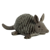 A gray armadillo plsuh toy with soft body and ridged back for lifelike charm by Aurora stuffed animals.