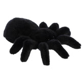 A black tarantula plush from Mini Flopsie by Aurora with eight legs and a realistic spider design.