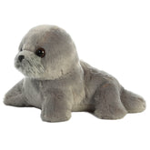 A gray fat seal plush from Mini Flopsie by Aurora with soft fur and an endearing expression.