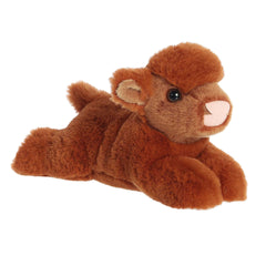 Soft plush Highland cow calf with long, wavy fur and horns, in rich brown, capturing the Scottish Highlands charm.