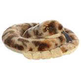 A coiled rattlesnake plush toy with soft patterned scales and a friendly plush face.