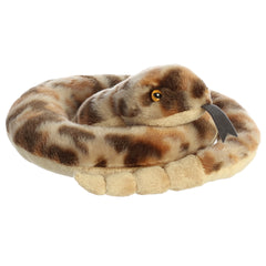 A coiled rattlesnake plush toy with soft patterned scales and a friendly plush face.