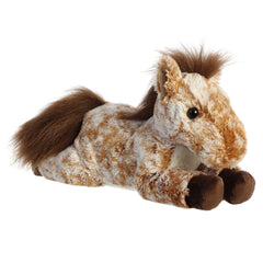 Plush toy of a brown and white horse with mottled fur and a fluffy mane and tail by Aurora stuffed animals.