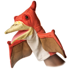 Hand puppet of a flying Pteranodon with plush wings and beak, perfect for dinosaur fun.