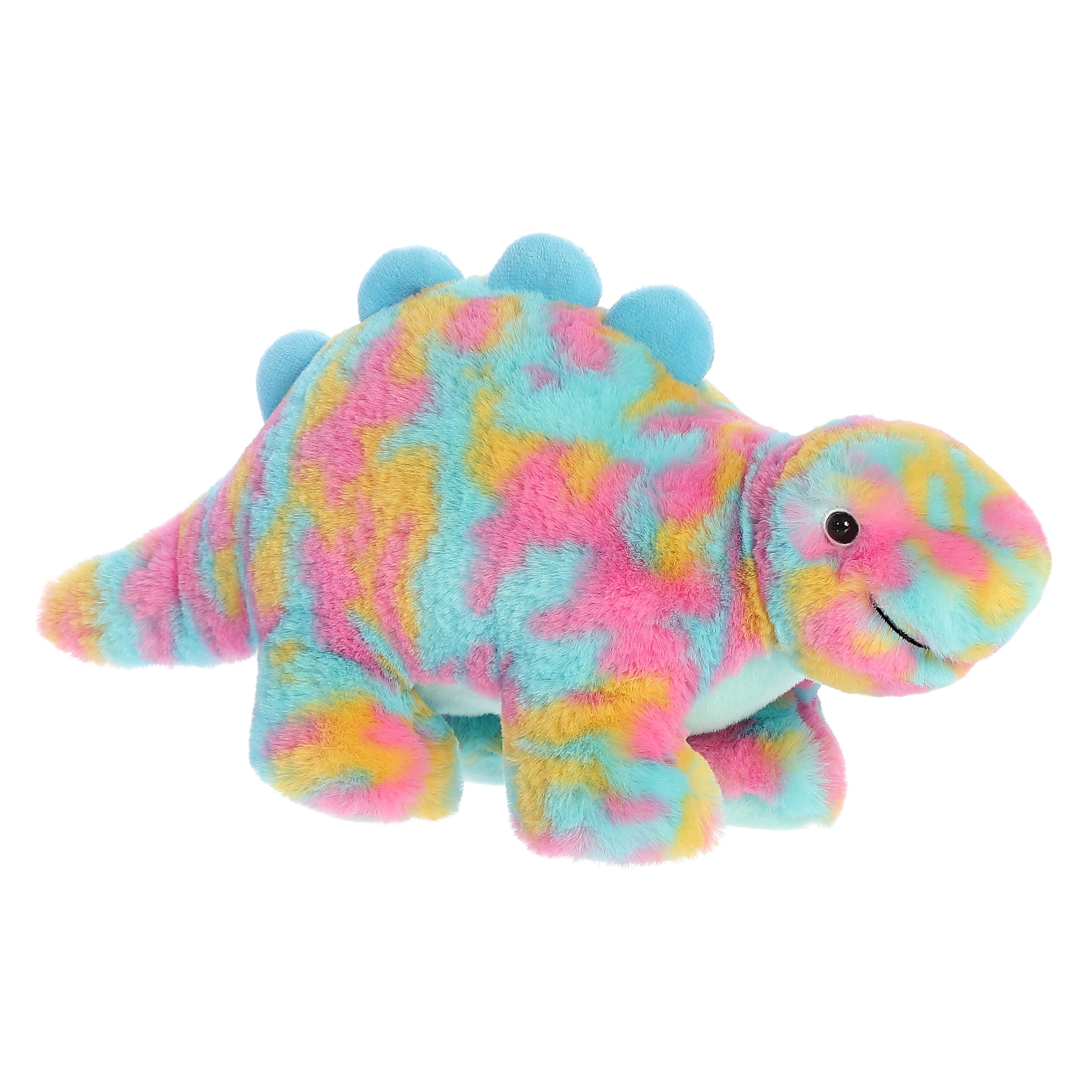 A vibrant Stegosaurus dino plush with a multicolored watercolor body, blue spikes, and a big infectious smile