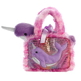 Fancy Pals Narwhal plush from Aurora, with a silver horn, nestled in a pink sequined carrier
