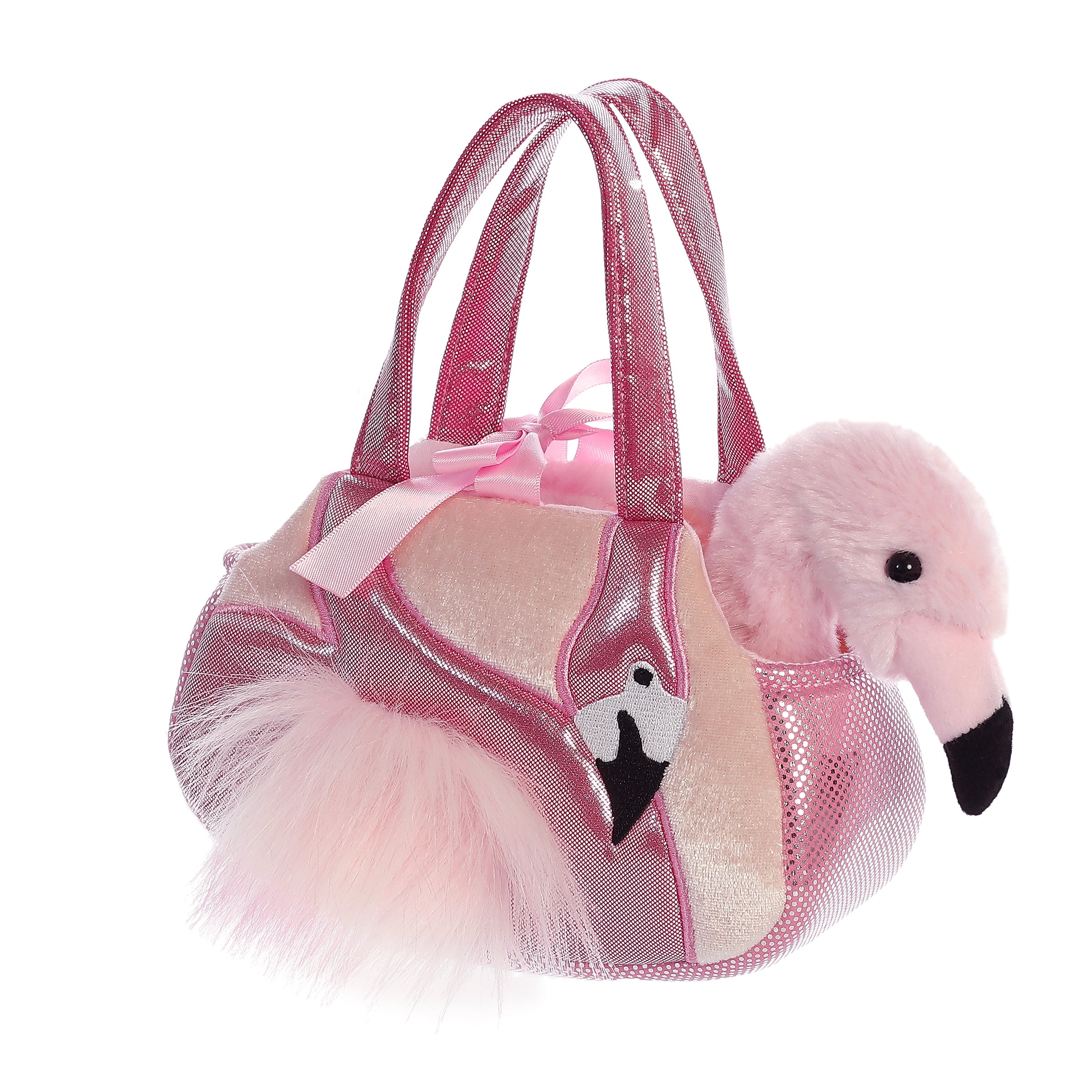 Ava Flamingo plush from Fancy Pals by Aurora, nestled in a pink carrier with faux feathers