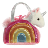 Over The Rainbow Unicorn plush from Fancy Pals by Aurora, with a silver horn, nestled in a rainbow-designed carrier