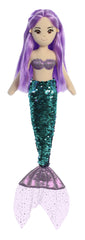 A green-sequin mermaid plush toy from Sea Sparkles by Aurora with purple hair and a sparkling top.