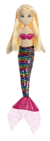 A multicolored sequin mermaid plush toy from Sea Sparkles by Aurora with blonde hair and a pink top.