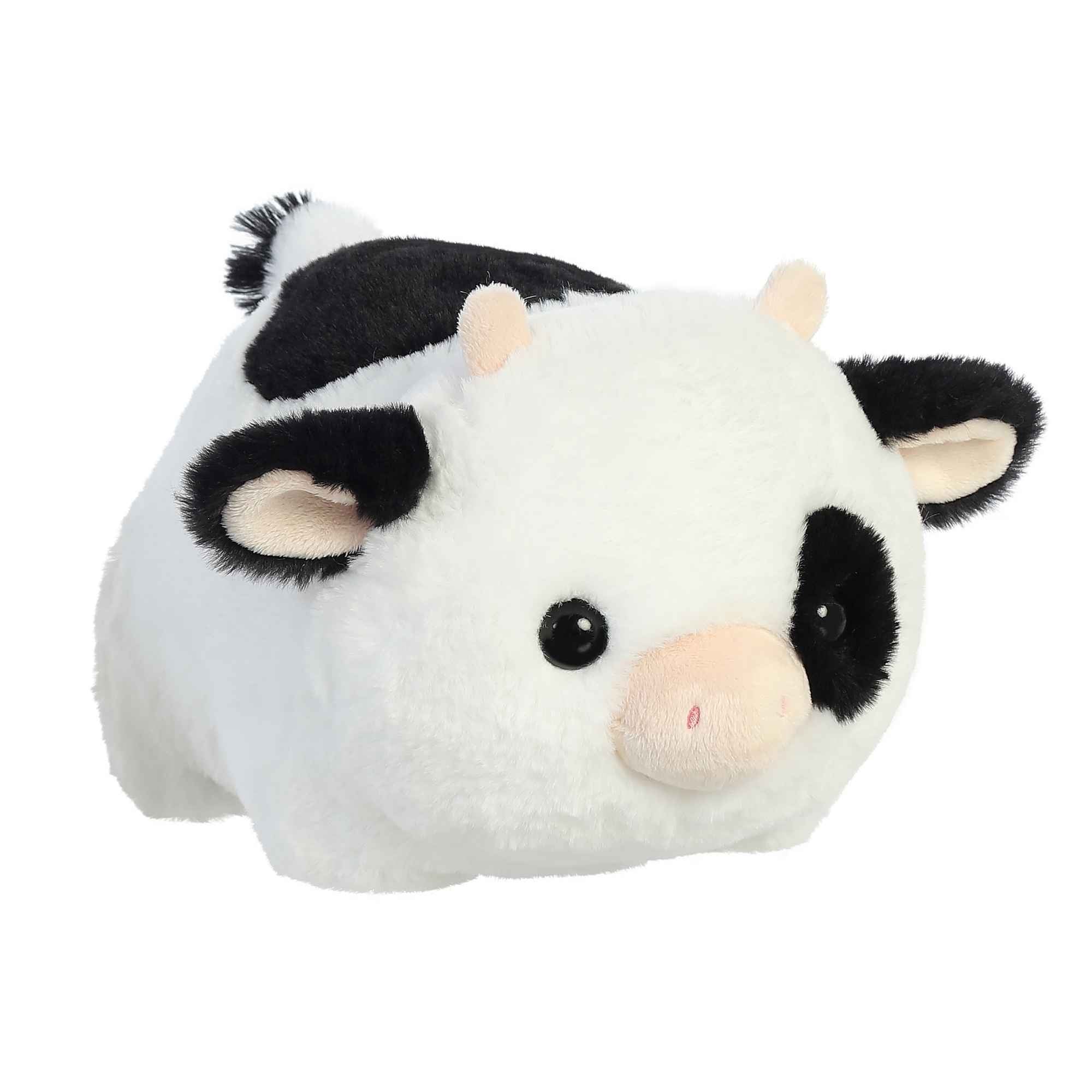 Tutie Cow plush from the Spudsters Collection by Aurora, featuring a soft black and white coat in a rounded potato shape