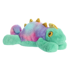Chameleon plush resting flat, showcasing its vibrant teal body with colorful hues along its back and tail, and yellow spikes.