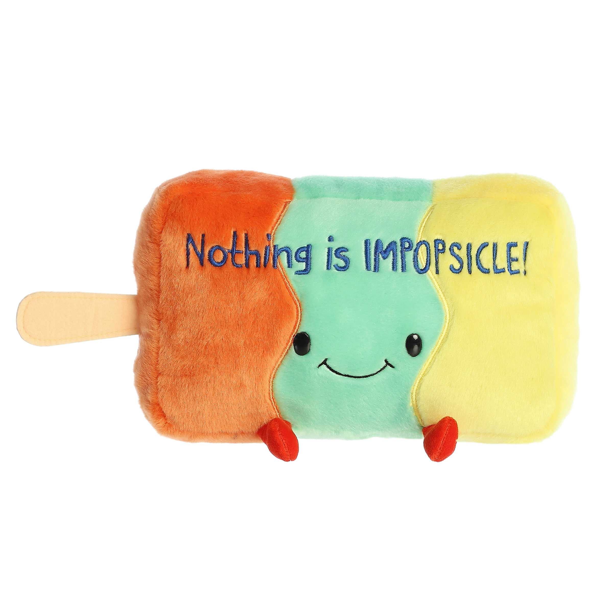 Cute popsicle plush with orange, green and yellow body, "Nothing is IMPOPSICLE" pun written across and a smiling face design