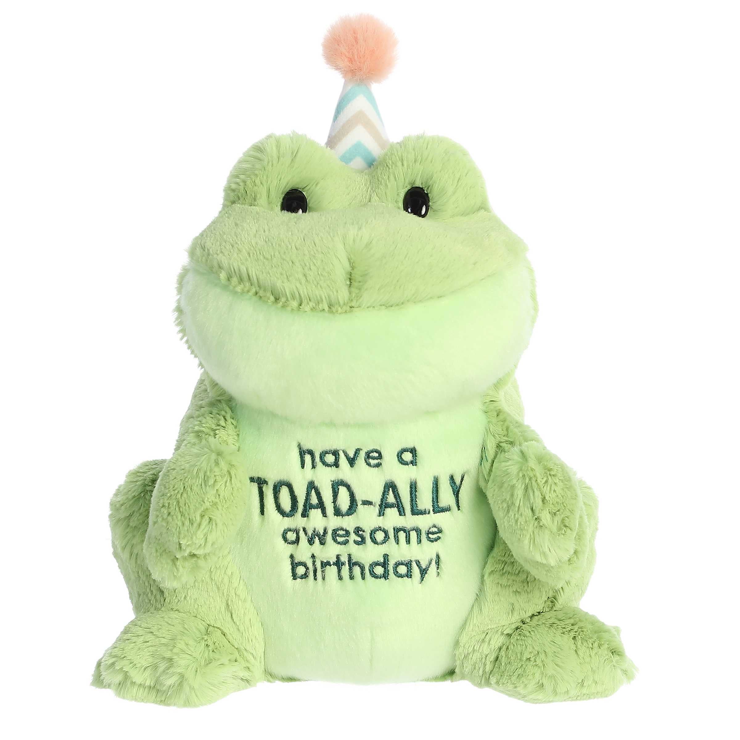 Cute frog plush toy with a green body, wearing a birthday hat, and "Have a TOAD-ALLY awesome birthday!" pun written across