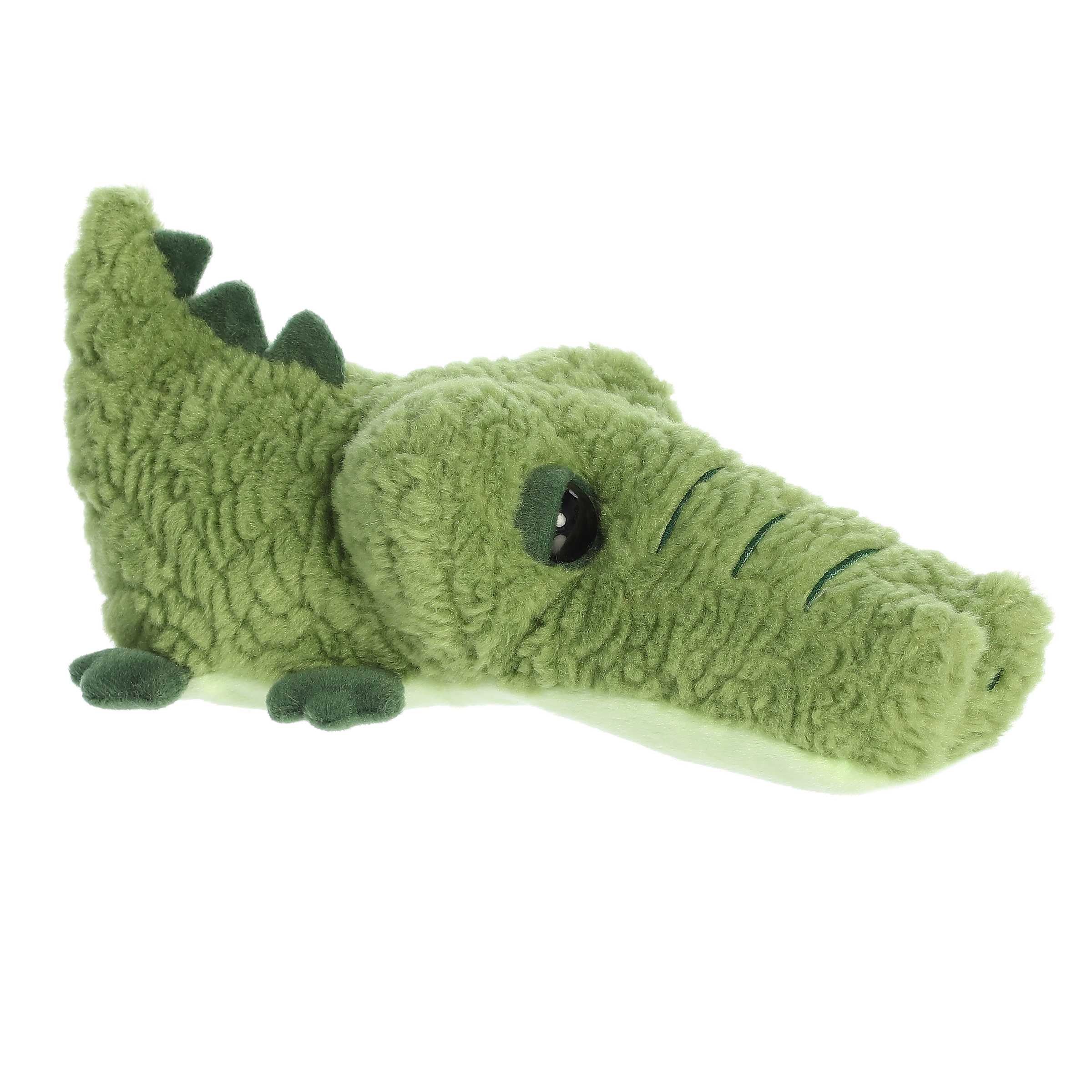 Arlie Alligator from Schnozzles, featuring a unique snout and soft green fur, ideal for imaginative play and cozy cuddles