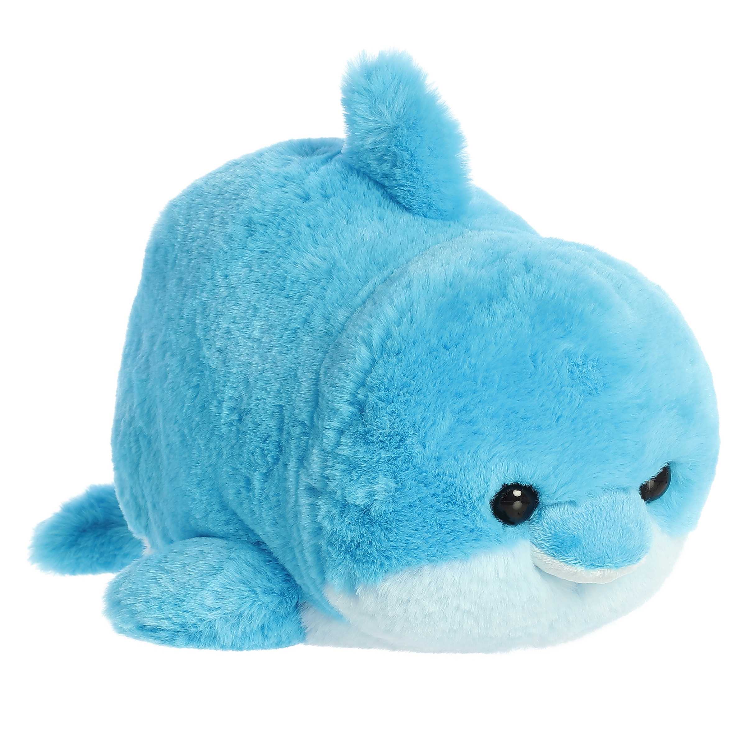 Dilly Dolphin from Spudsters, a vibrant blue potato-shaped plush with a friendly smile