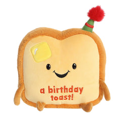 A Birthday Toast!' plush from Just Sayin', with a party hat, soft and cuddly