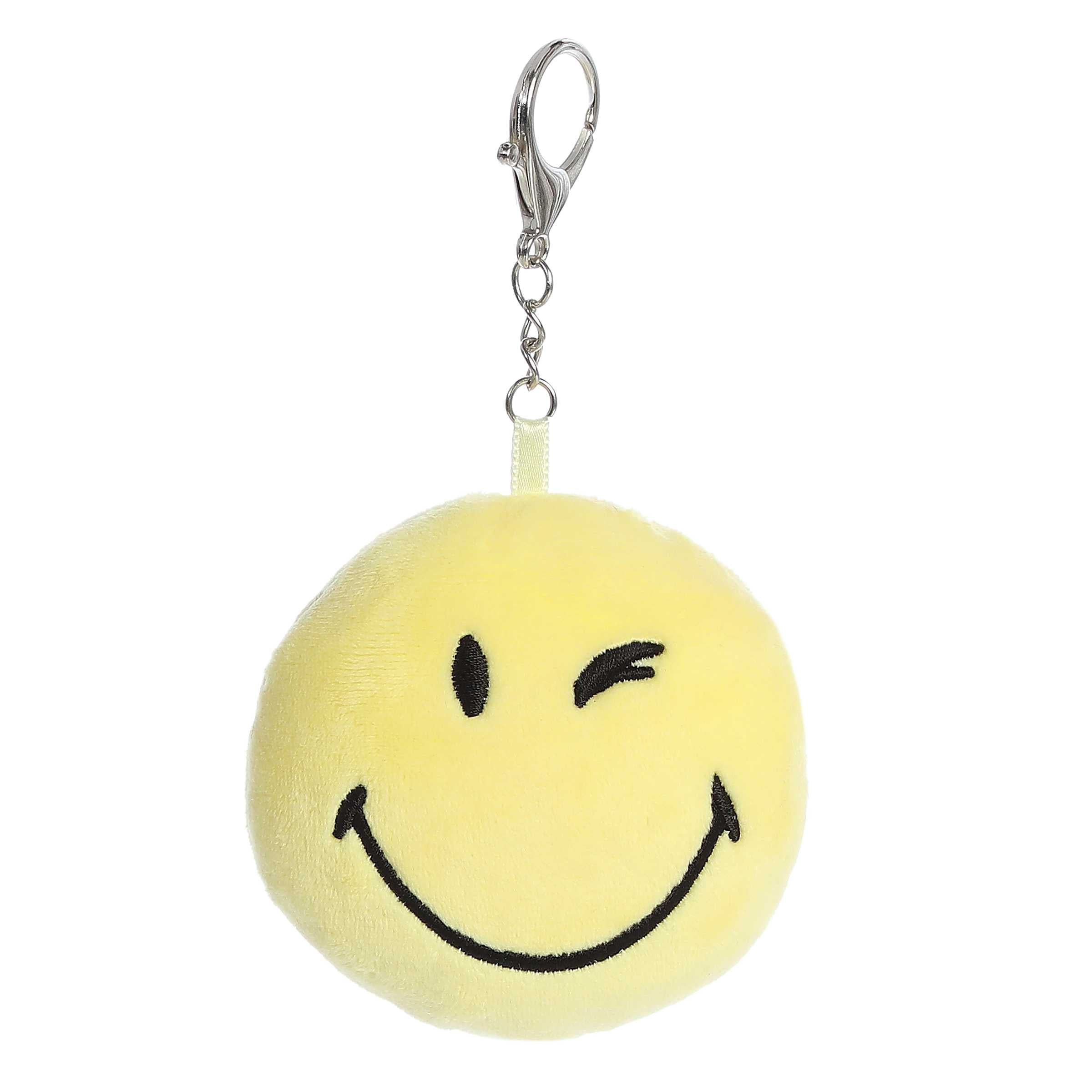 Wink Clip-On from SmileyWorld, a soft and durable winking smiley face keychain
