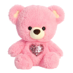 Soft pink bear with a shimmering pink sparkle heart on its chest, from Aurora's Bear stuffed animals collection.