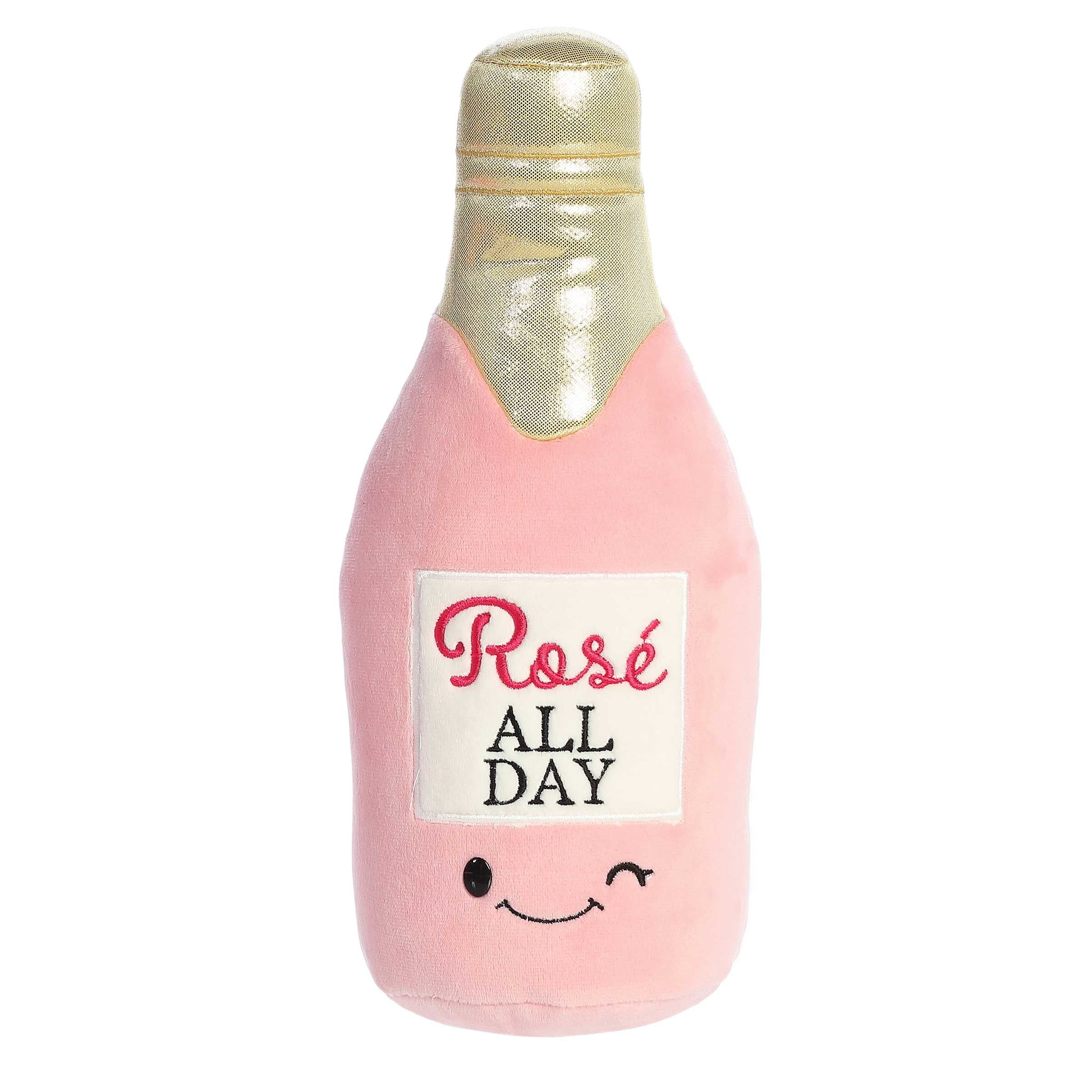Aurora Plush Rosé bottle in a soft pink hue with 'Rosé All Day' embroidery and a playful winking expression