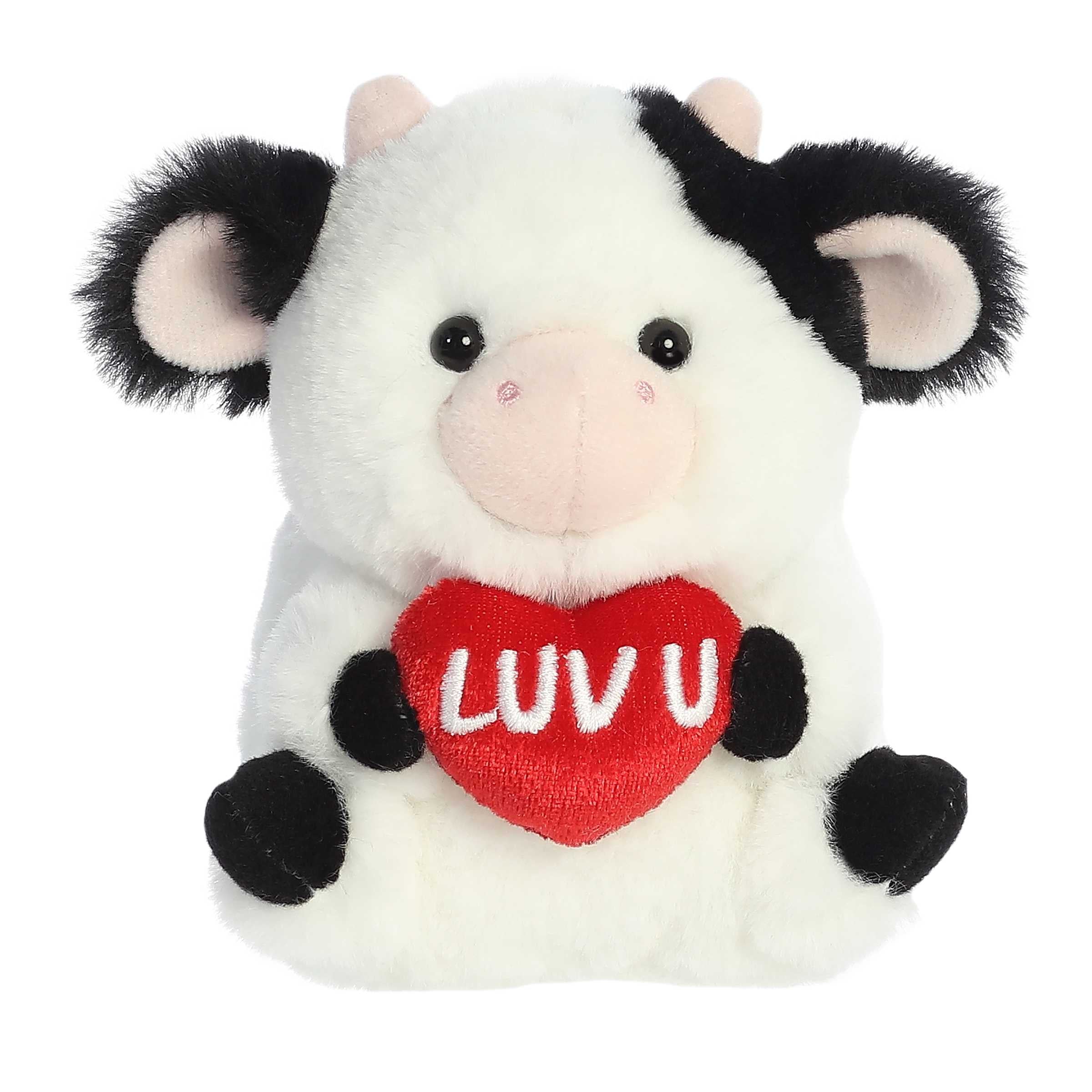 Adorable Cow plush from Rolly Pets collection, poised playfully on its back with a ‘Luv U’ heart, ready to share love.