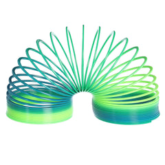 Oversized, colorful spring toy, captivating with its ability to cascade and flip, offering engaging play.