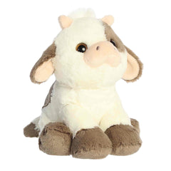 A soft plush cow with a creamy coat, brown spots, and floppy ears from Lil Dreamers by Aurora.