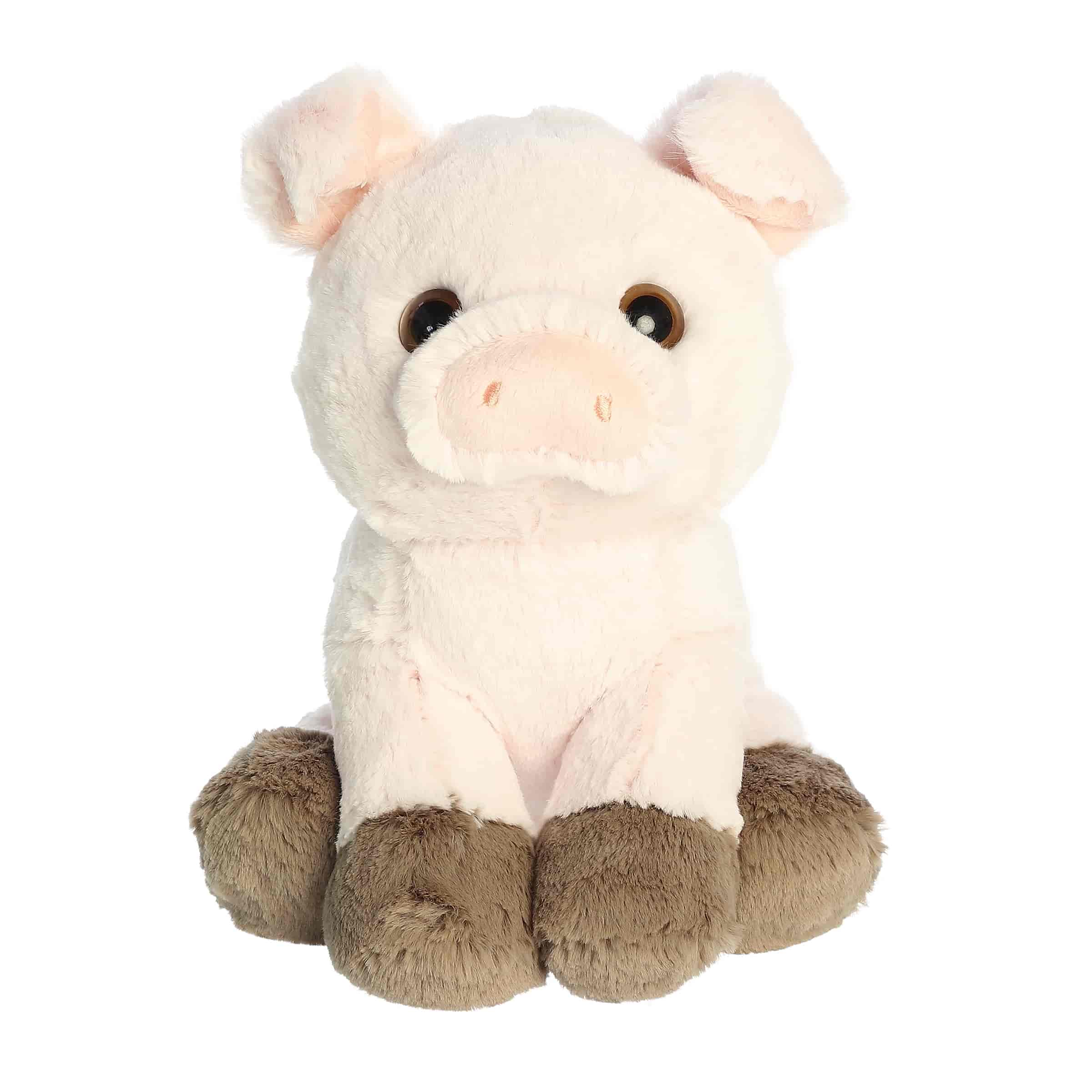 A soft pink plush pig with brown hooves and an upward gaze from Lil Dreamers by Aurora.