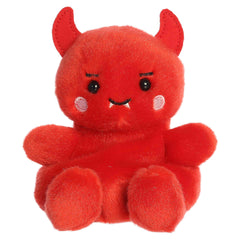 Red devil plush with tiny horns, a smile, and fits in the palm of your hand.