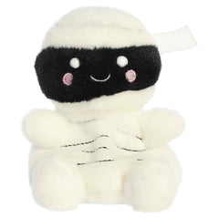 White mummy plush with wrapped details and a peeking dark face