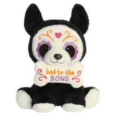 Black and white Xolo dog plush with sugar skull details and a themed sign