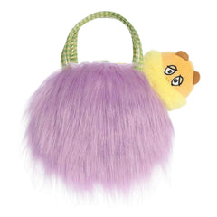 A plush Lorax inside a fuzzy purple Truffula Tree–inspired purse from Dr. Seuss x Aurora