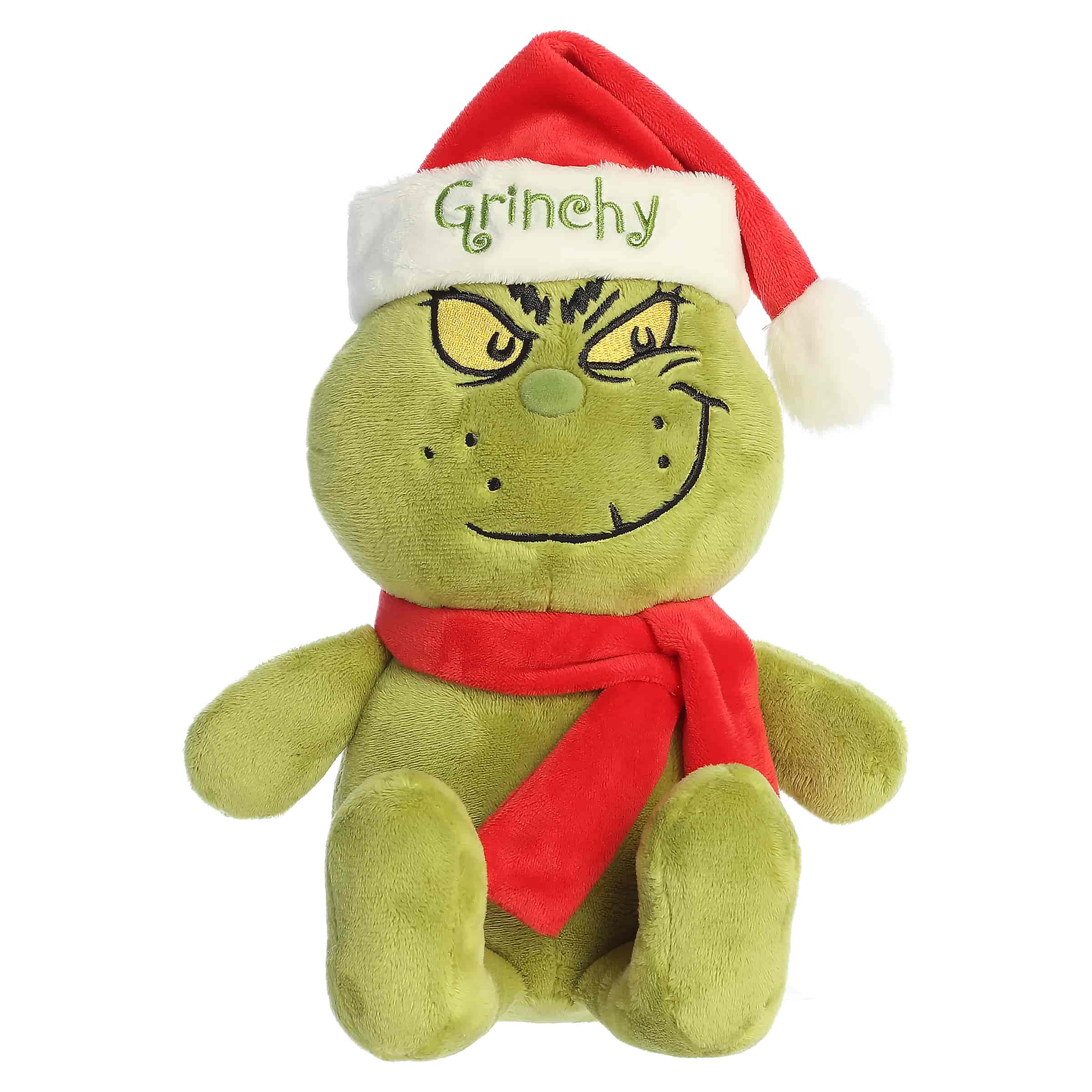 Green Grinch plush wearing a Santa hat and red scarf