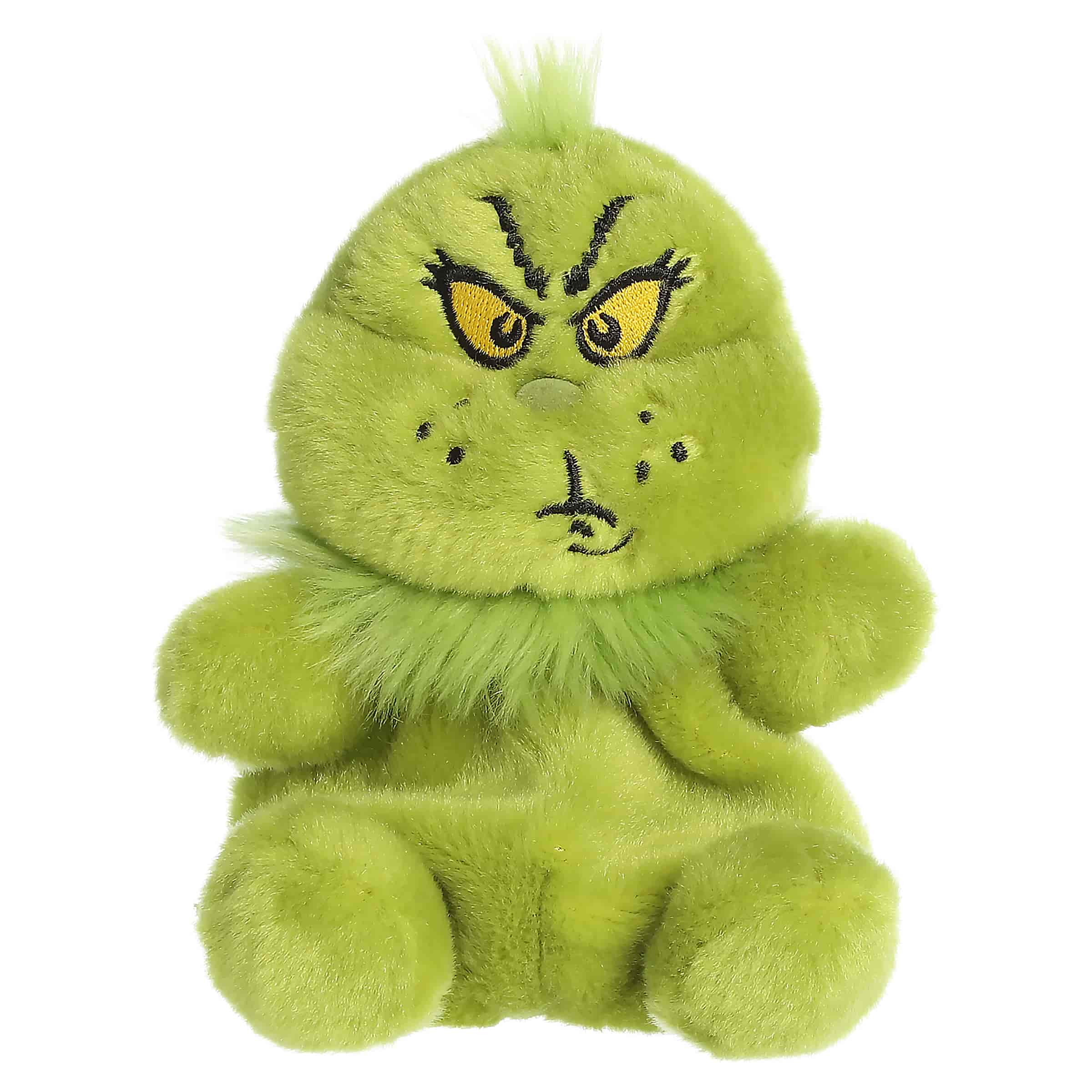 Green Grinch plush with a cheeky mischievous expression