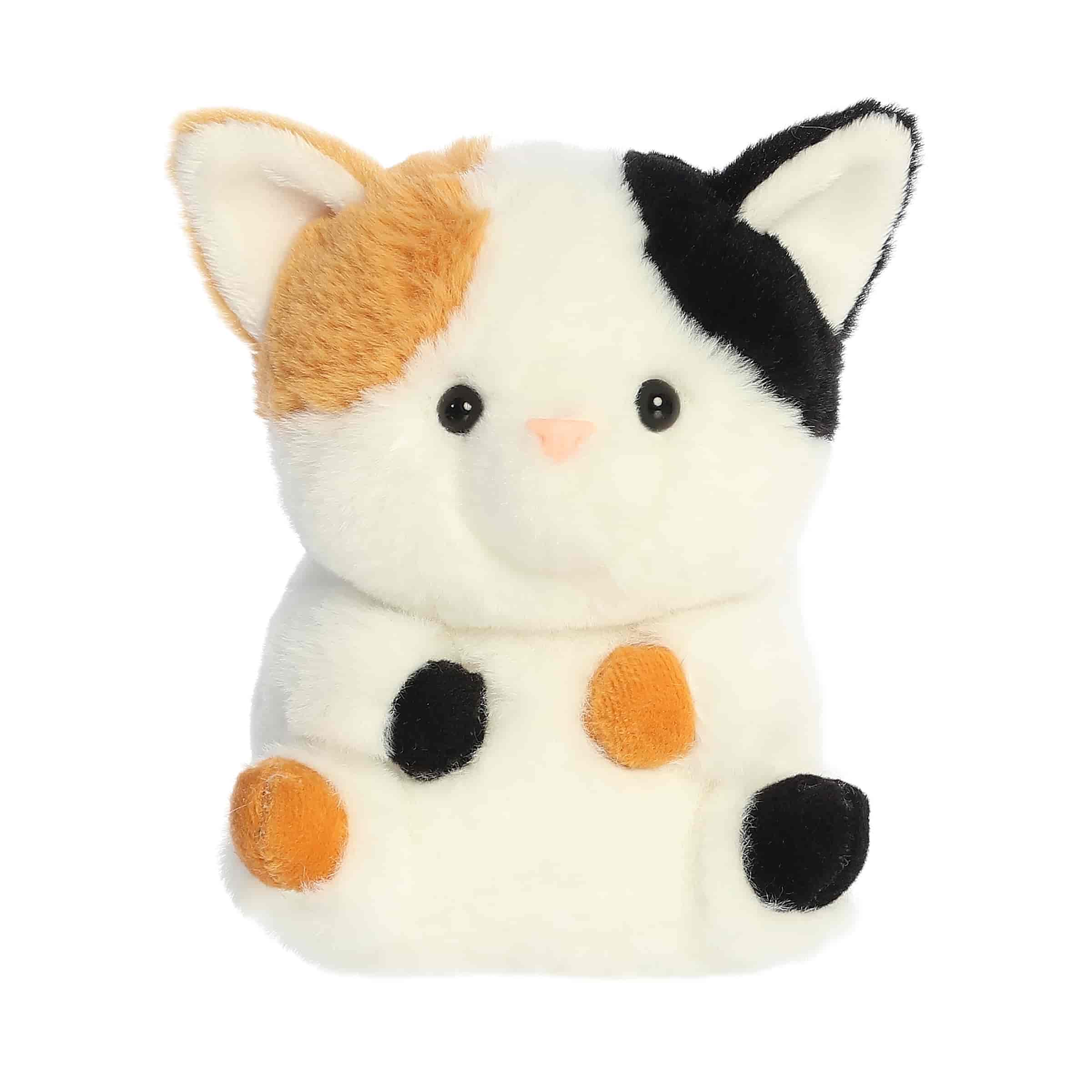 A soft white plush calico cat with orange and black patches from Rolly Pets by Aurora.