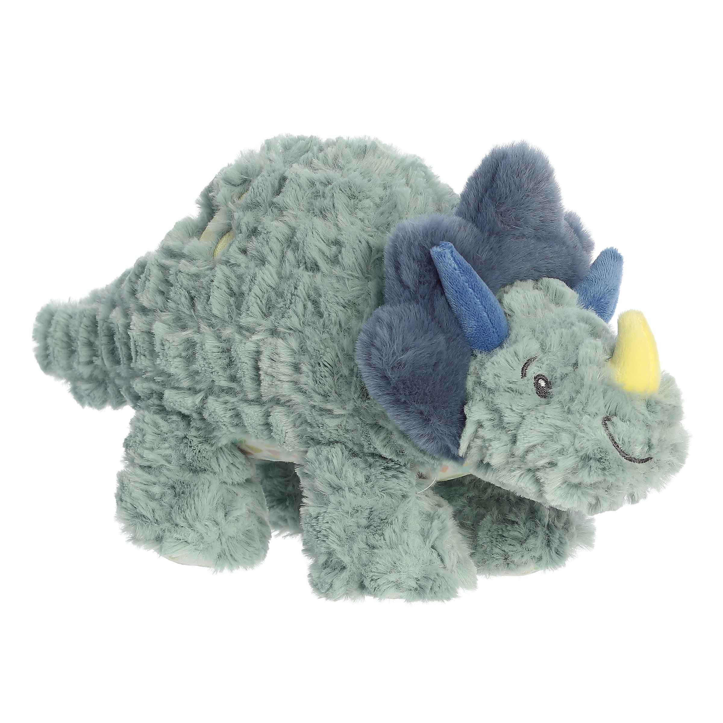 Charming Traci Triceratops plush, designed for safety and comfort, perfect for new parents and nurseries.