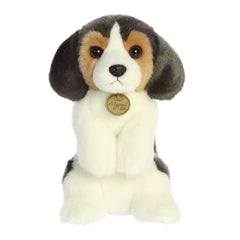 Adorable Beagle Pup plush in a sitting pose with a mix of white and brown hues, exuding charm and lifelike appeal.