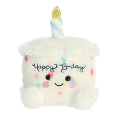 Happy B'day Cake plush from Palm Pals, frosted with confetti sprinkles and golden candle, joyful