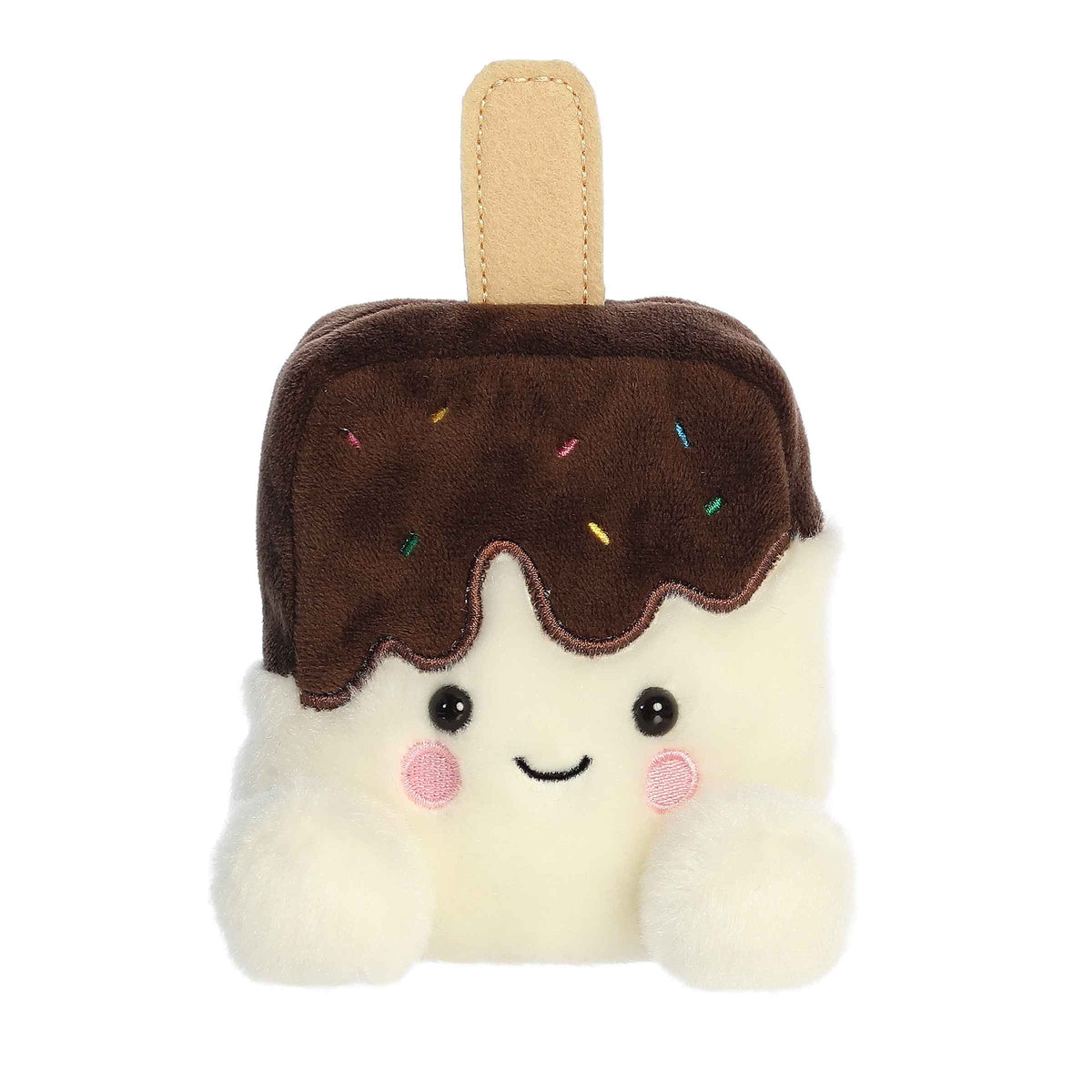 Plush toy of a chocolate-coated ice cream bar in the Palm Pals collection with a stick handle and a happy face.