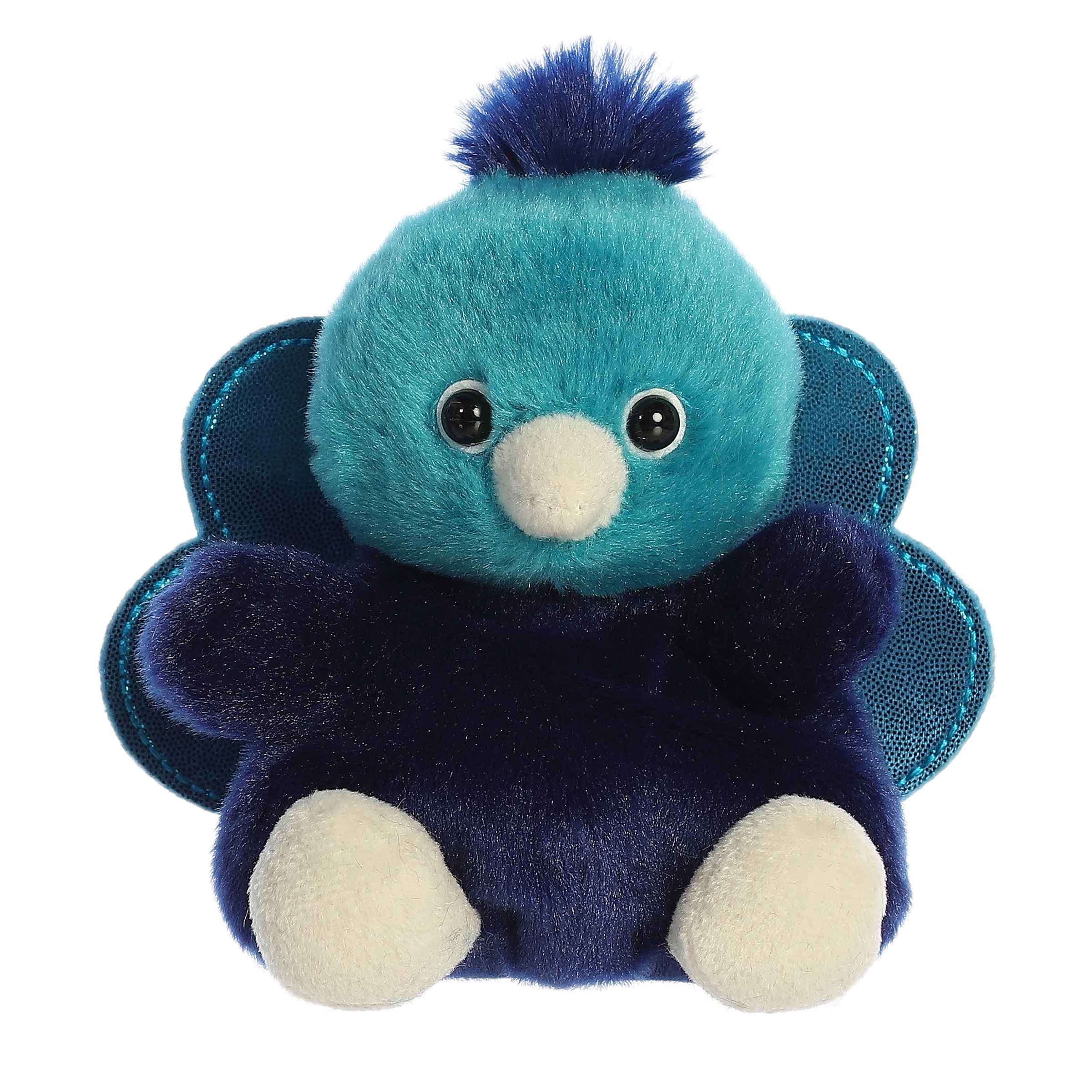 Plush toy of a blue peacock in the Palm Pals collection with a tuft of darker blue feathers.