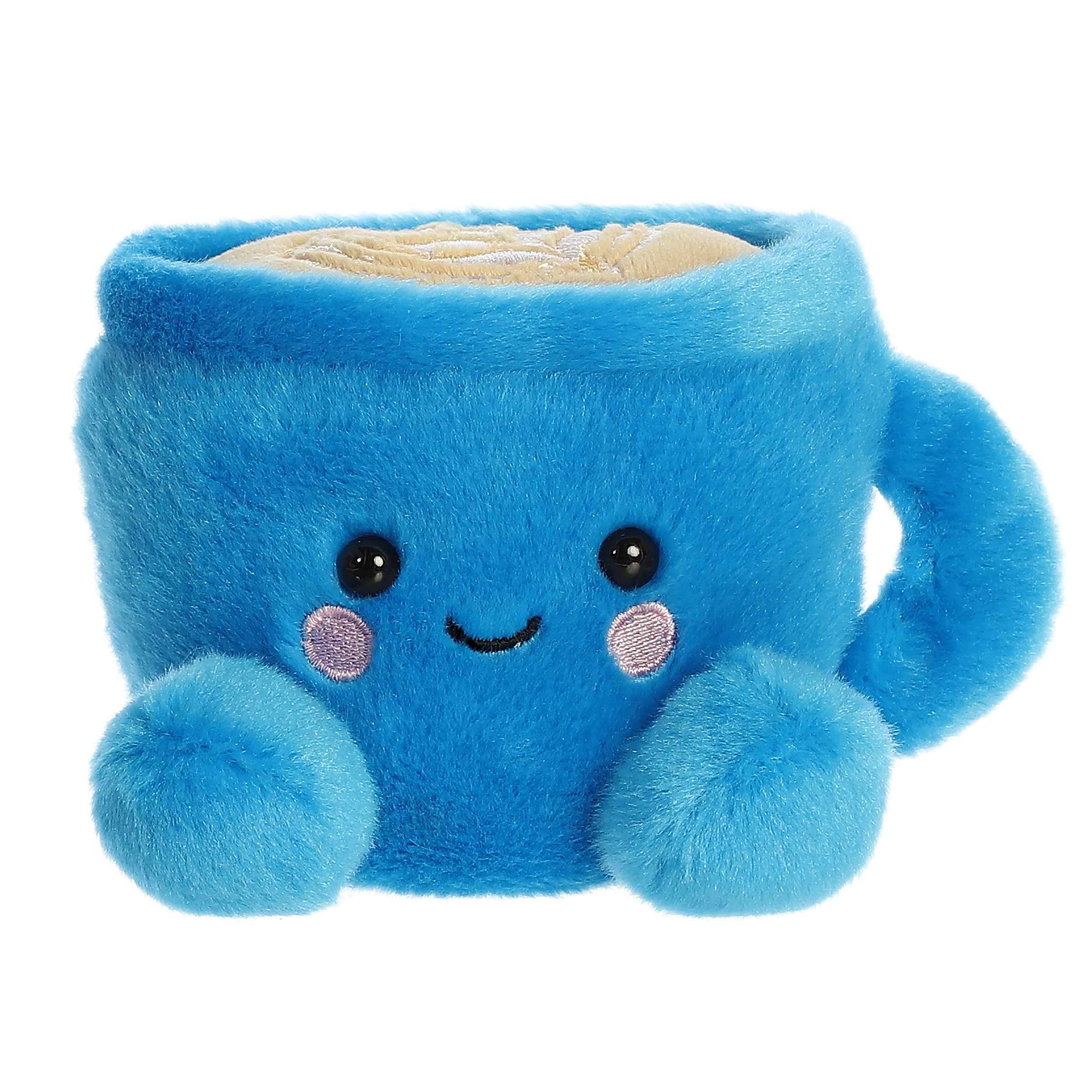 Plush toy of a blue latte cup in the Palm Pals collection with whipped cream topping and a cheerful face.