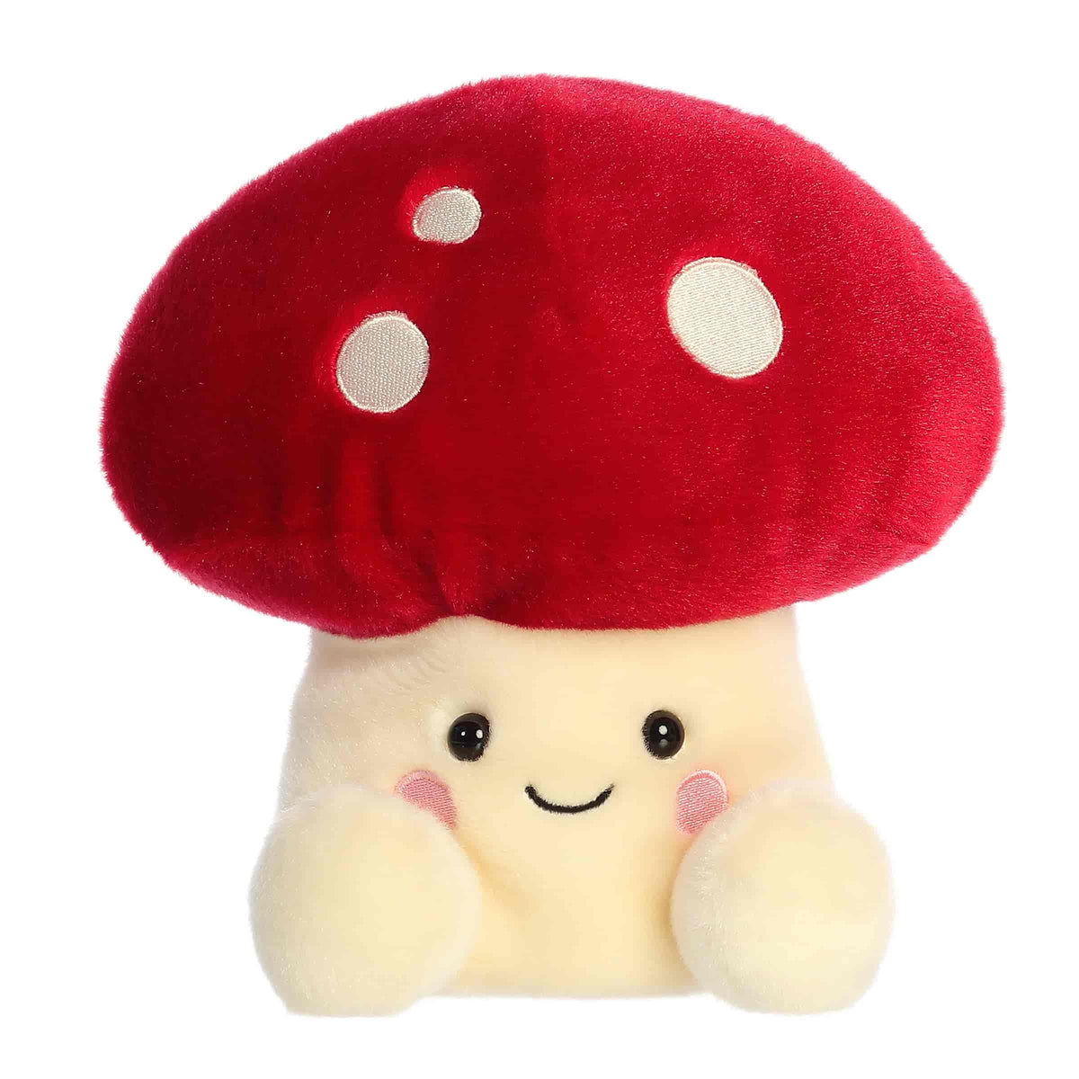 Larger toy of red Amanita mushroom plush in the Palm Pals collection, with a smiling face and white spots.